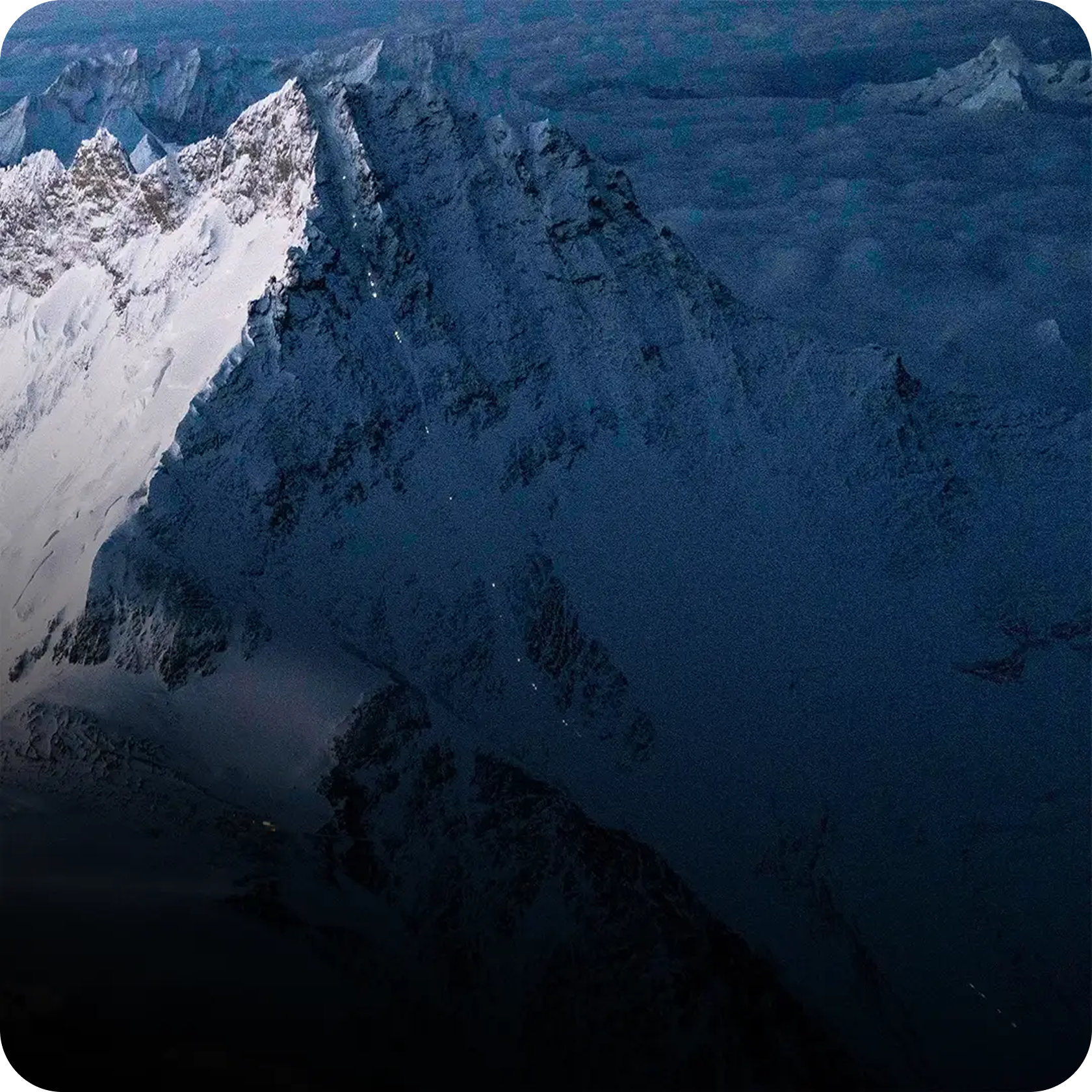 Wide view of rugged snowy Himalayan range